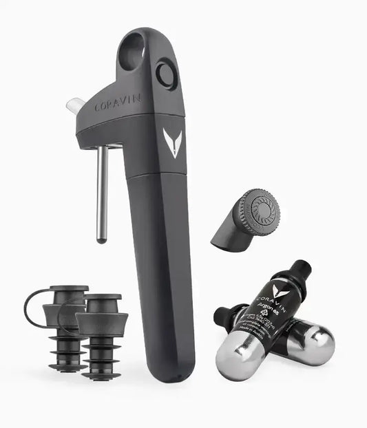 A black Coravin Pivot™+ Wine Preservation System with a handle, featuring a close-up of the device and two metal containers.