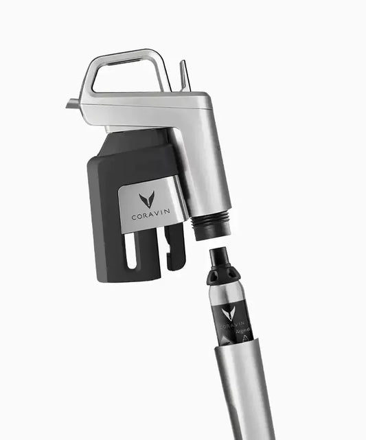 A silver and black device with a black cap, compatible with Coravin Timeless and Pivot™ Wine Preservation Systems.