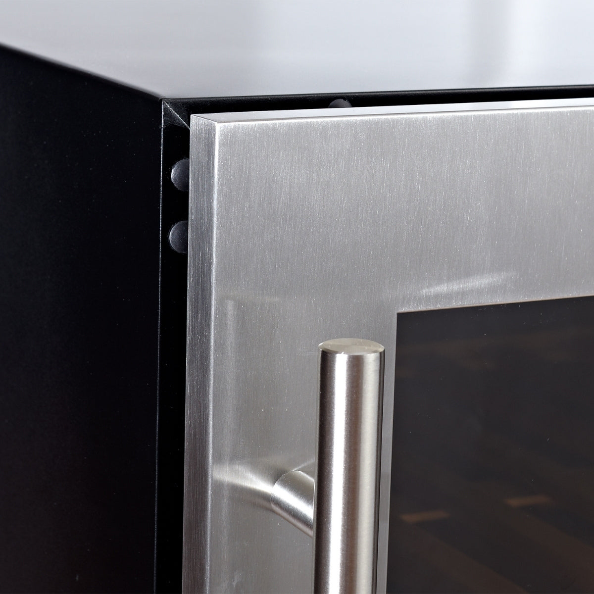 A close-up of a black and silver cabinet with a borderless black glass door, showcasing the Kings Bottle Upright Wine & Beverage Cooler Combo With Low-E Glass.