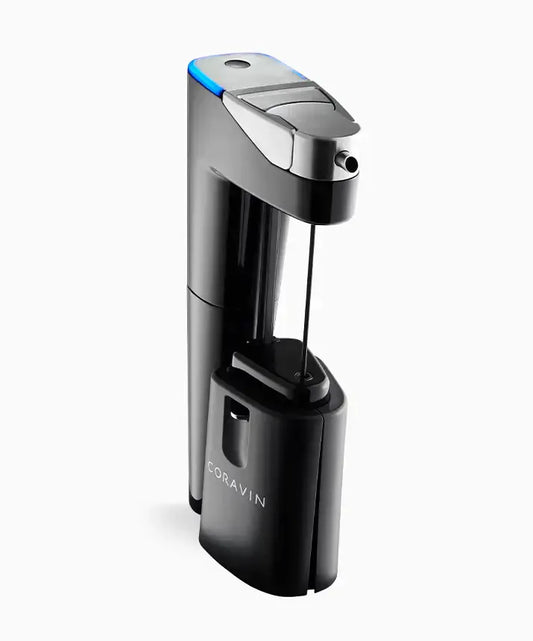 Coravin Timeless Eleven Wine Preservation System: A black and silver device with a blue light, perfect for preserving still wines for months or years. Includes key accessories and connects to the Coravin Moments App for added controls.