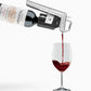 Coravin Timeless Six+ Wine Preservation System pouring wine into a glass