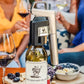 A wine bottle with a corkscrew, part of the Coravin Timeless Six+ Wine Preservation System.