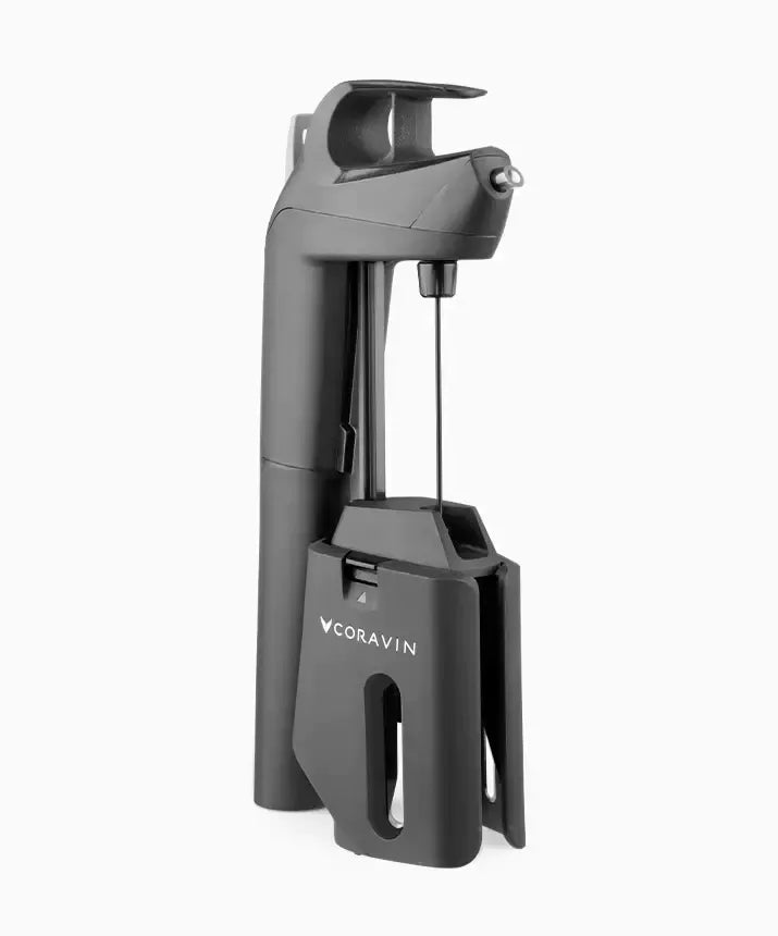Coravin Timeless Three+ Wine Preservation System with black corkscrew and accessories.