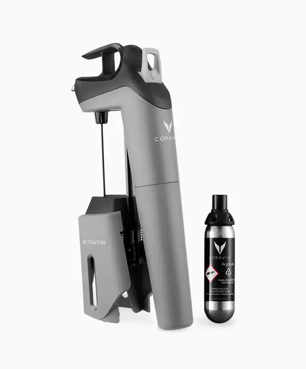 Coravin Timeless Three SL Wine Preservation System: A grey and black device with a black spray can and a black can with white text.