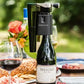 Coravin Timeless Aerator: A wine bottle and glass on a table, with the aerator attached to the Coravin system.