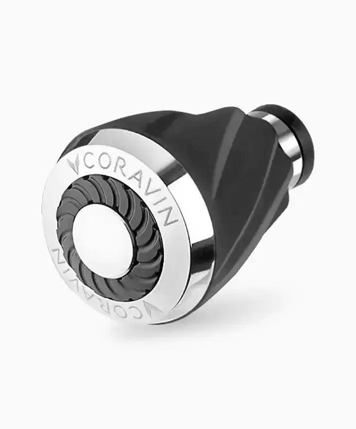 A black and silver Coravin Timeless Aerator, designed exclusively for Coravin Timeless Wine Preservation Systems, with 30 carefully placed holes for maximum wine aeration.