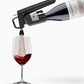Coravin Timeless Aerator being used to pour wine into a glass