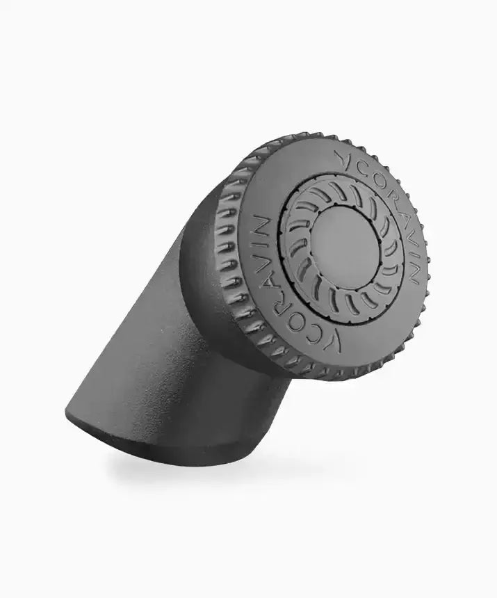 A black plastic pipe with a circular design, the Coravin Pivot™ Aerator, compatible with Pivot Wine Preservation Systems, for aromatic and flavorful wine in seconds.