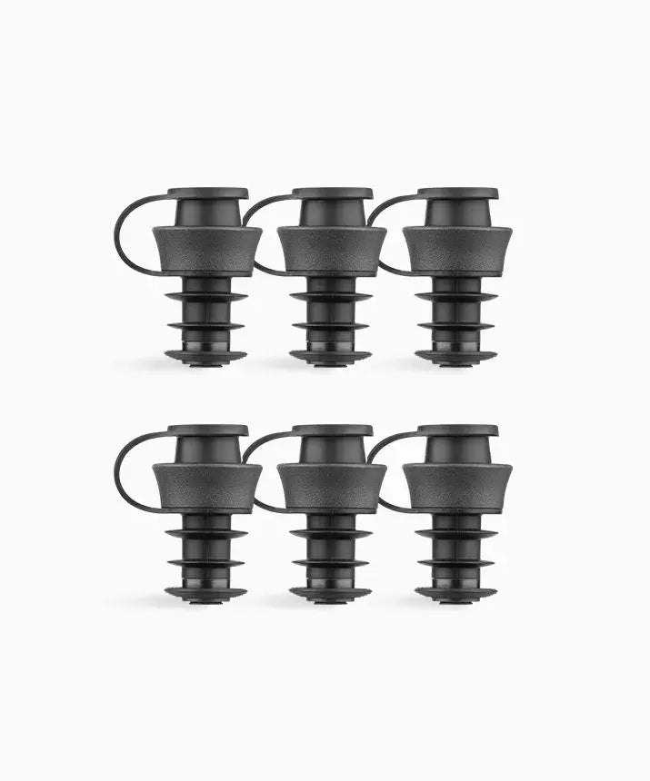 A group of black plastic Pivot™ Stoppers for wine bottles, compatible with Coravin Pivot™ Systems. Includes 6 stoppers.