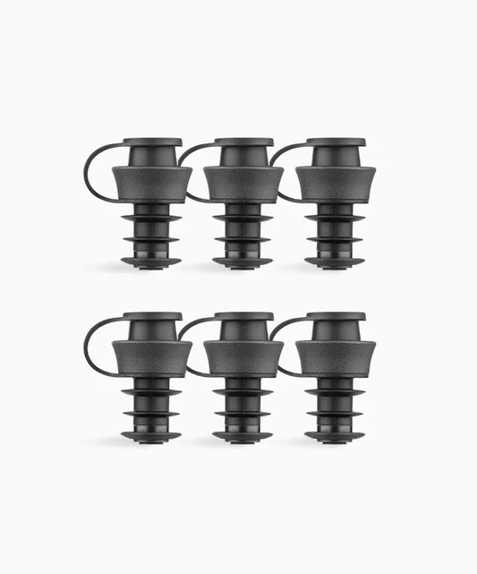 A group of black plastic Pivot™ Stoppers for wine bottles, compatible with Coravin Pivot™ Systems. Includes 6 stoppers.