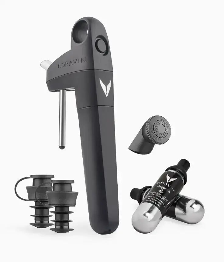 A black Coravin Pivot™+ Wine Preservation System with a handle, featuring a close-up of the device and two metal containers.