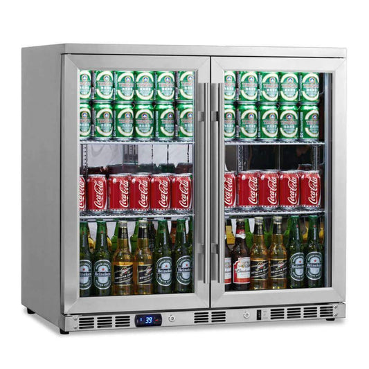 A stainless steel refrigerator filled with drinks and cans, including beer. Perfect for home and commercial bars.